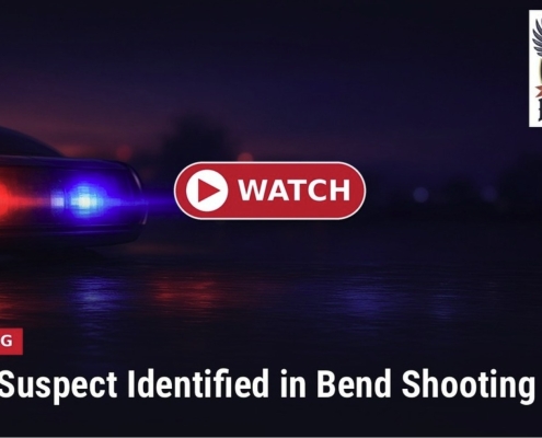 Fostoria News Police car with flashing lights at night during Bend school shooting.